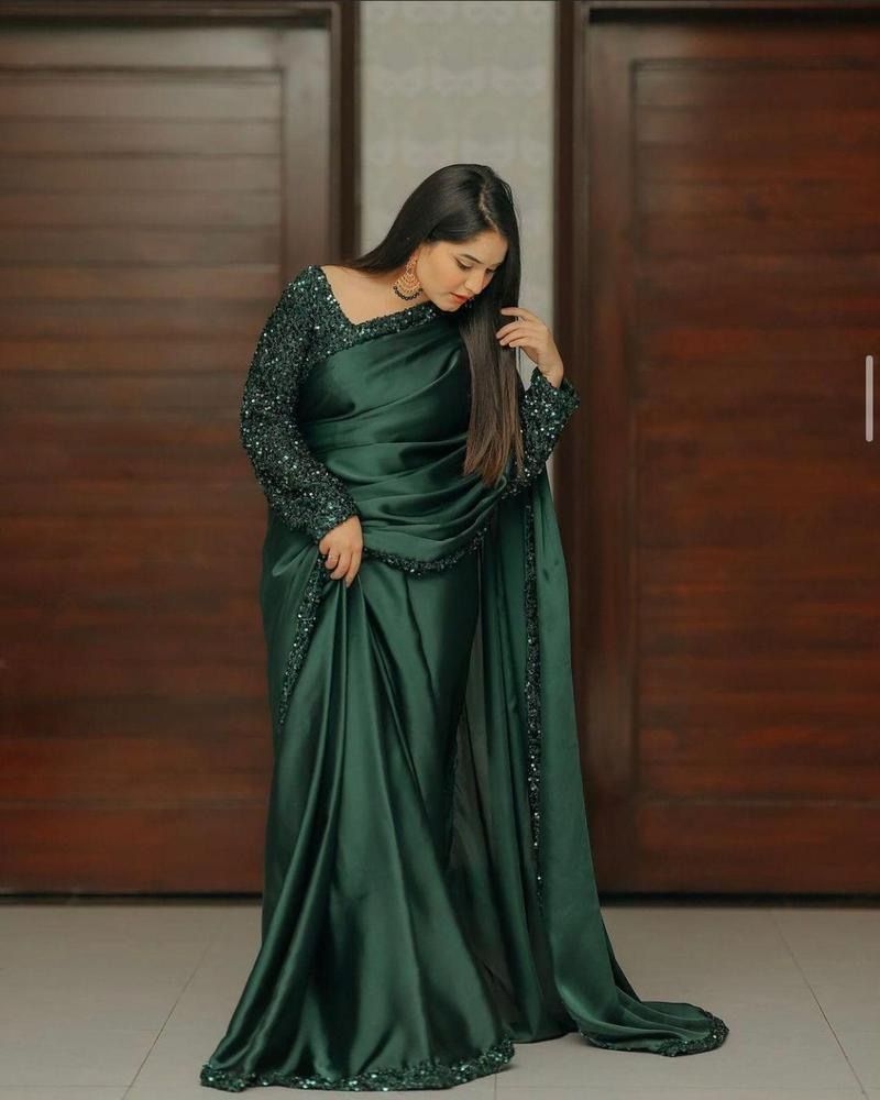 Draped in Elegance: The Allure of a Deep Green Saree