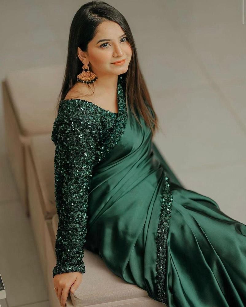 Draped in Elegance: The Allure of a Deep Green Saree